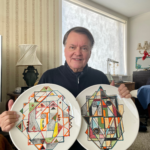 Valsson with two of his geometric ornaments