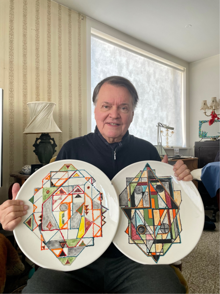 Valsson with two of his geometric ornaments